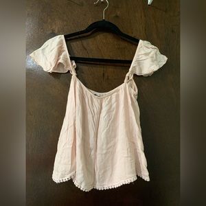 Pink flowy too with beaded detail on trim.